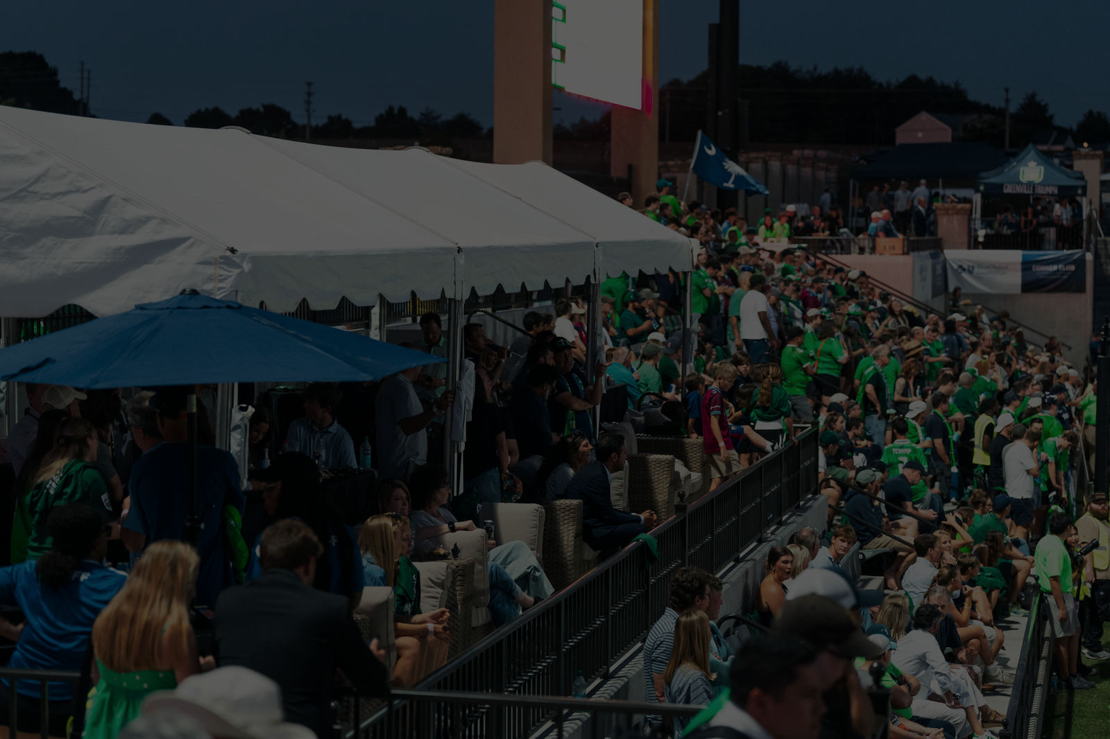 The Corner Club under the lights at GE Vernova Park
